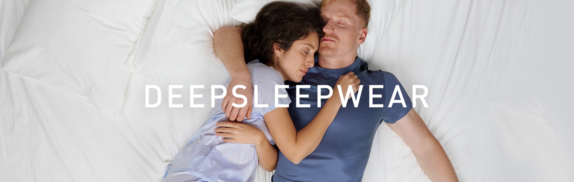 A man and a woman are wearing pyjamas from the Deepsleepwear Cooling range in blue.