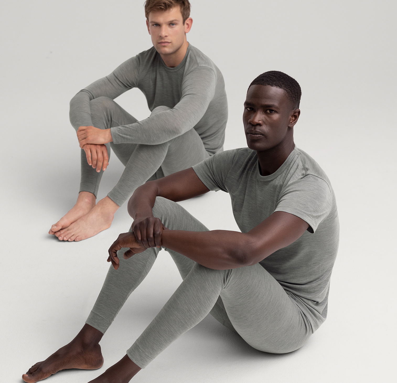 2 men in warm functional underwear from the Wool & Silk range.