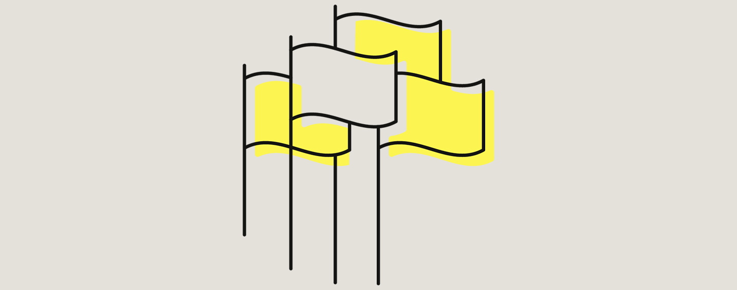 A yellow symbol with a handshake