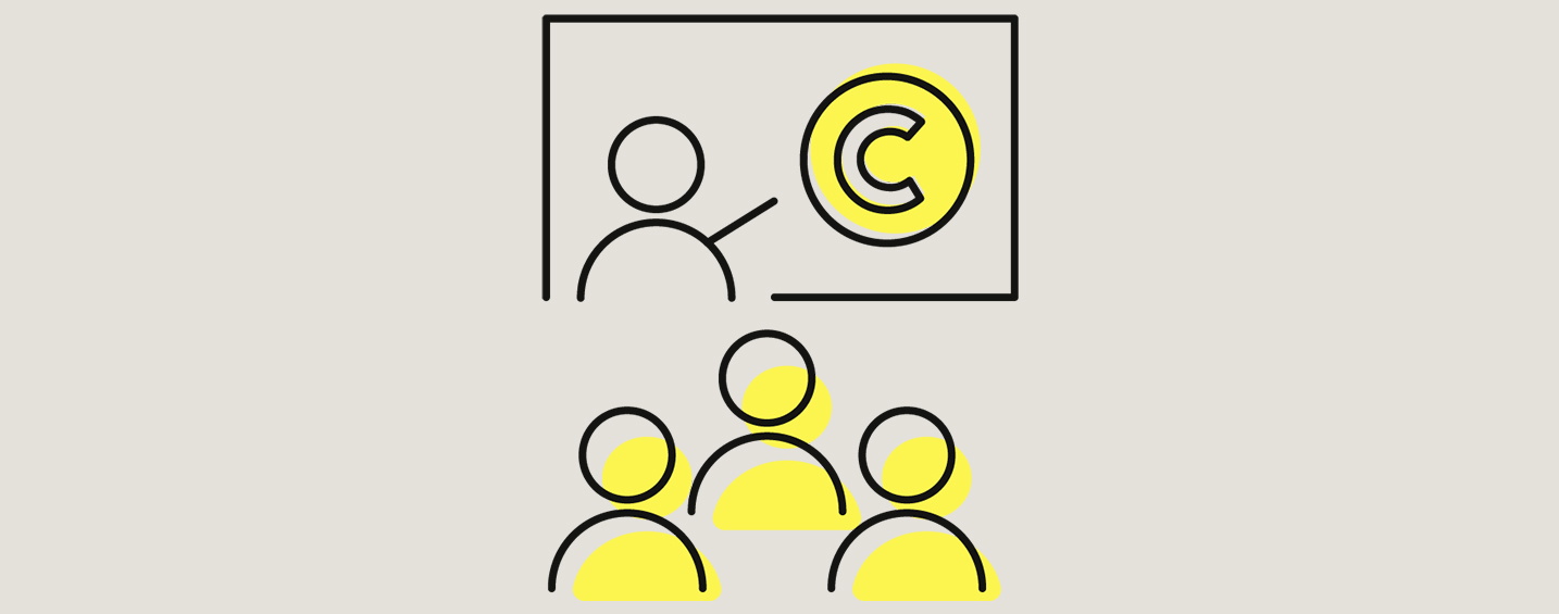 A yellow symbol with a handshake